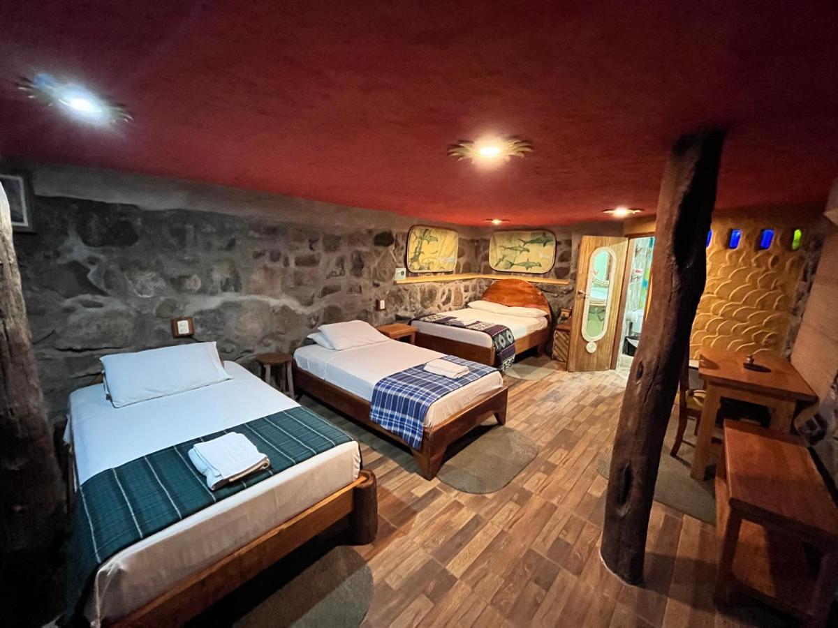 Lonesome George Ecolodge ปูแอร์โตอาโยรา ภายนอก รูปภาพ